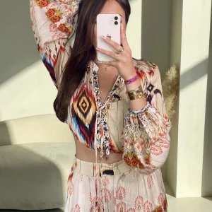 Pantalon Orée femme à rayures blanc cassé – coupe fluide et taille haute