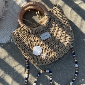 Sac en raphia beige avec anses dorées et bandoulière perles naturelles – modèle Ona de Ma Cumpana